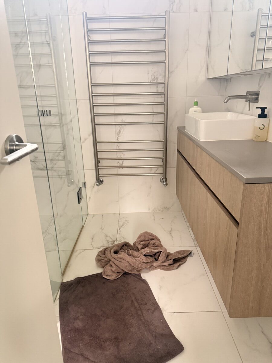 jake towel on floor in bathroom